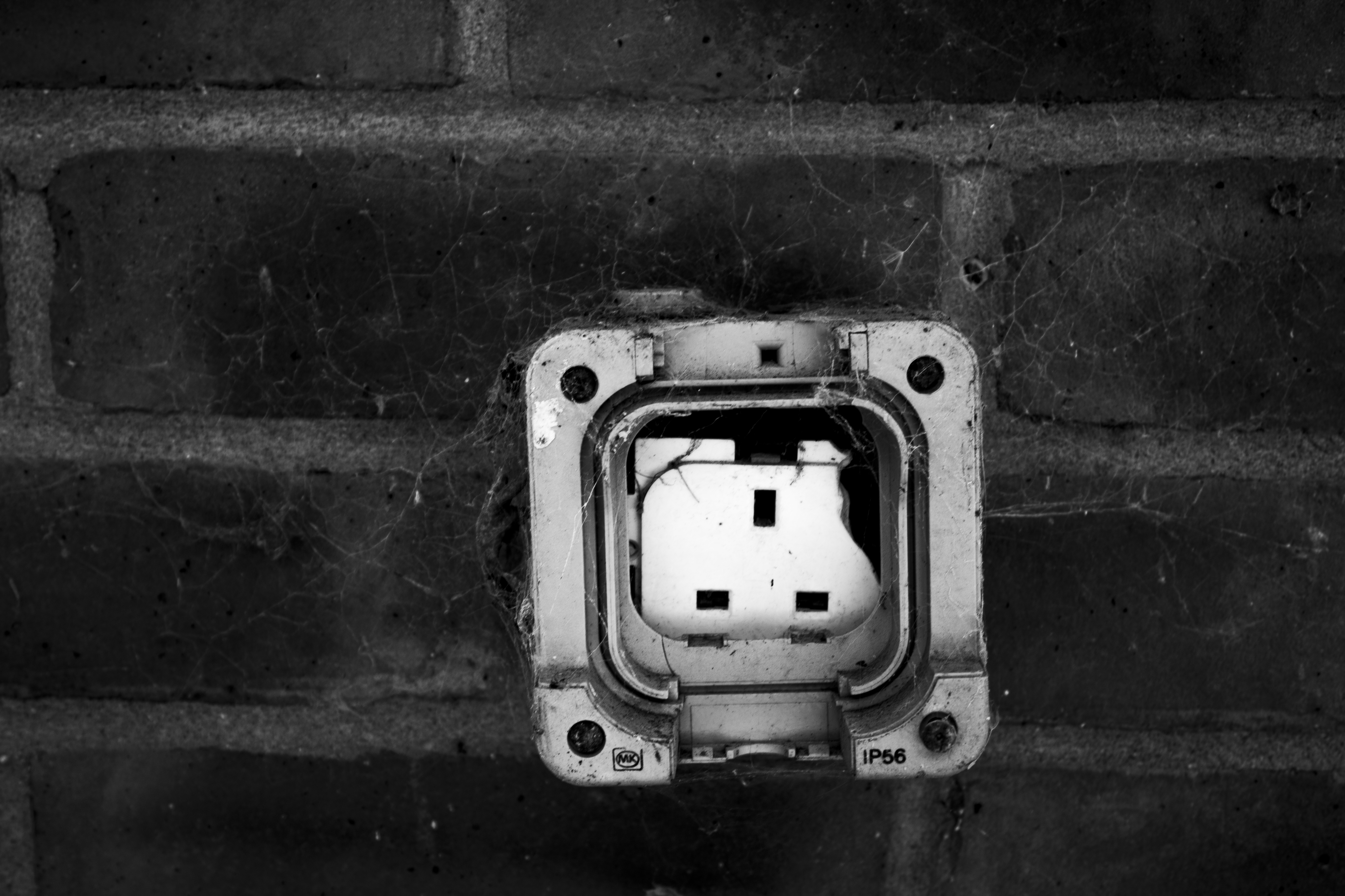 Close-up of abandoned electrical outlet
