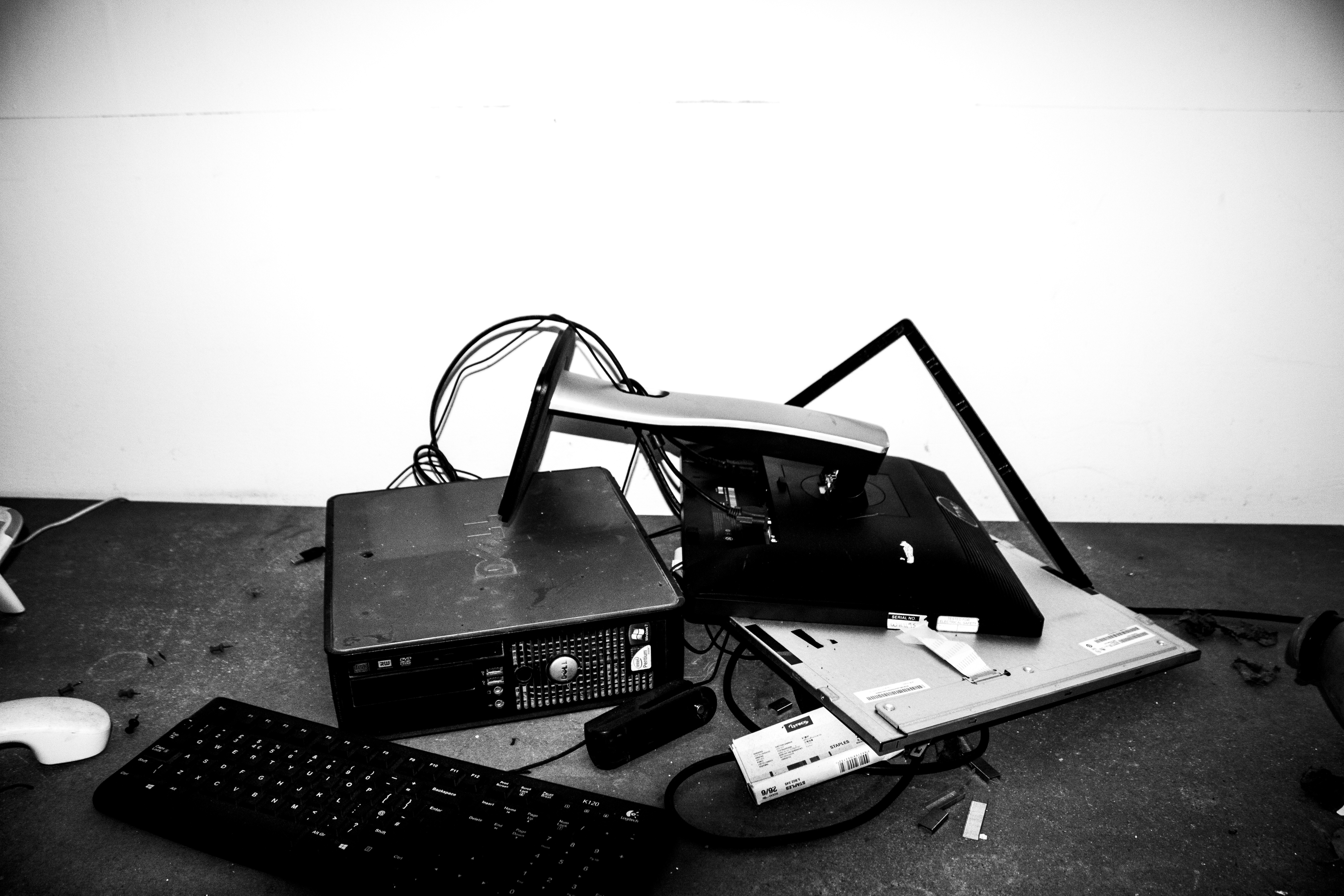 Discarded control panel and debris in office area