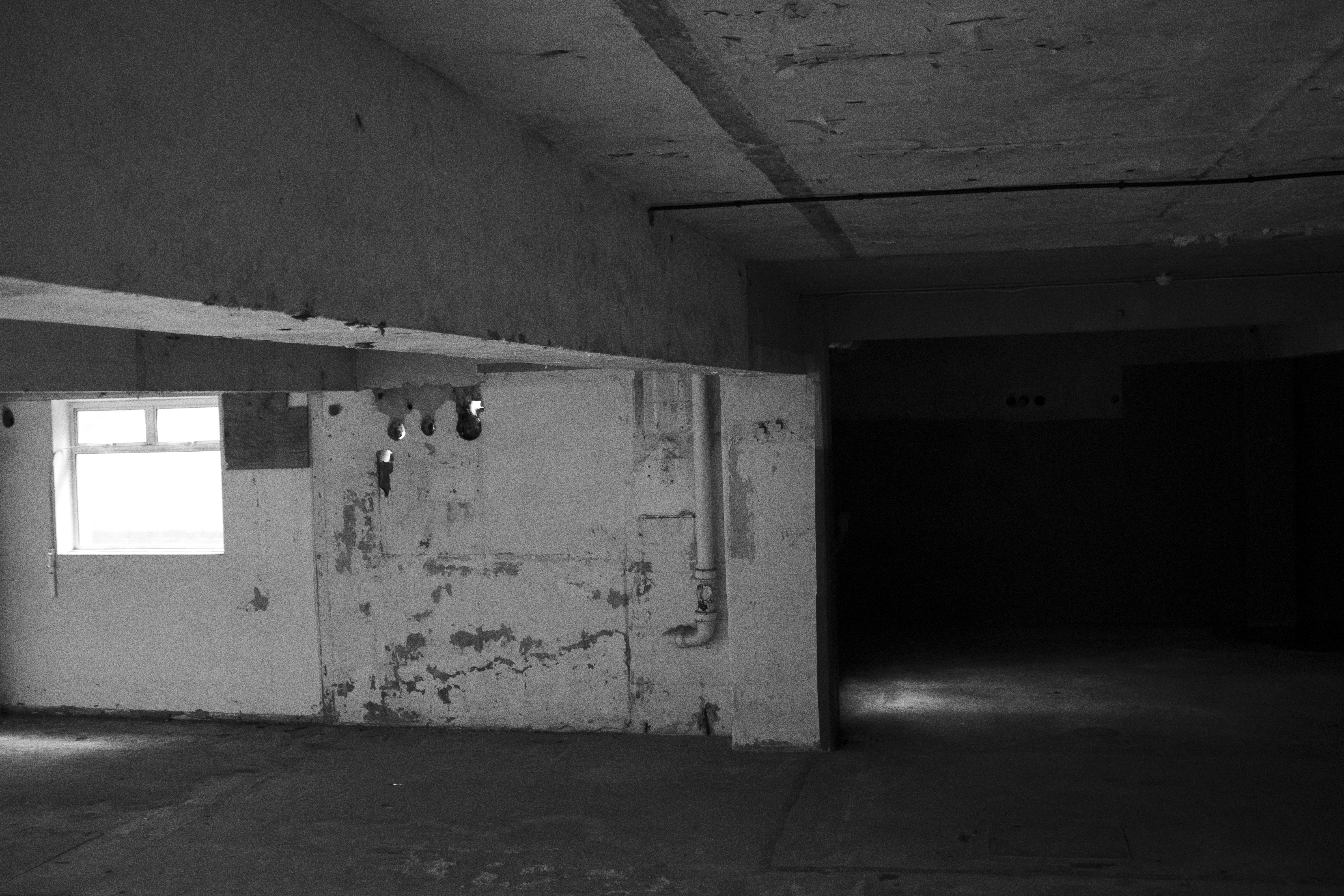 Low ceilinged service area in darkness