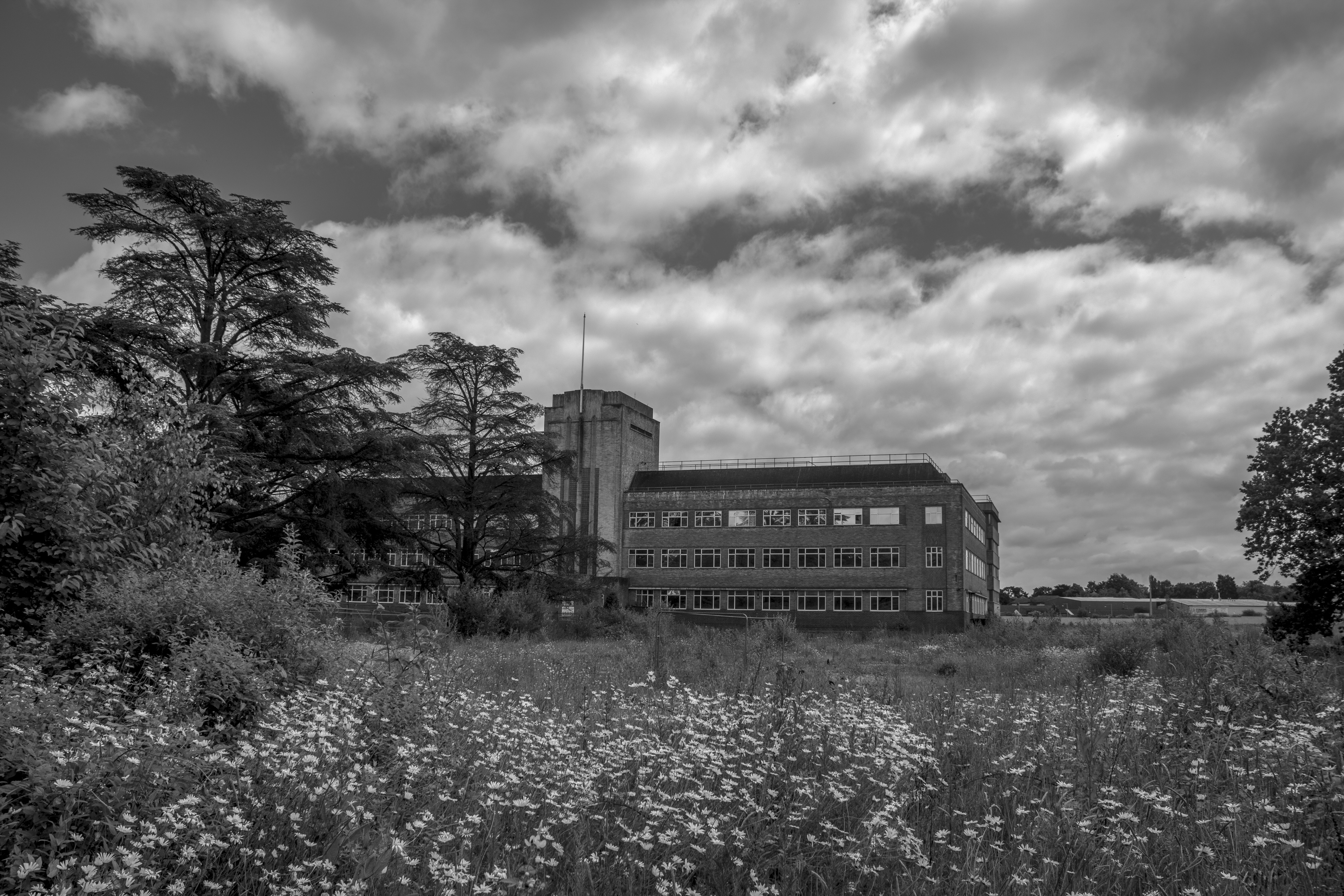 Towered central lab block looming over empty grounds