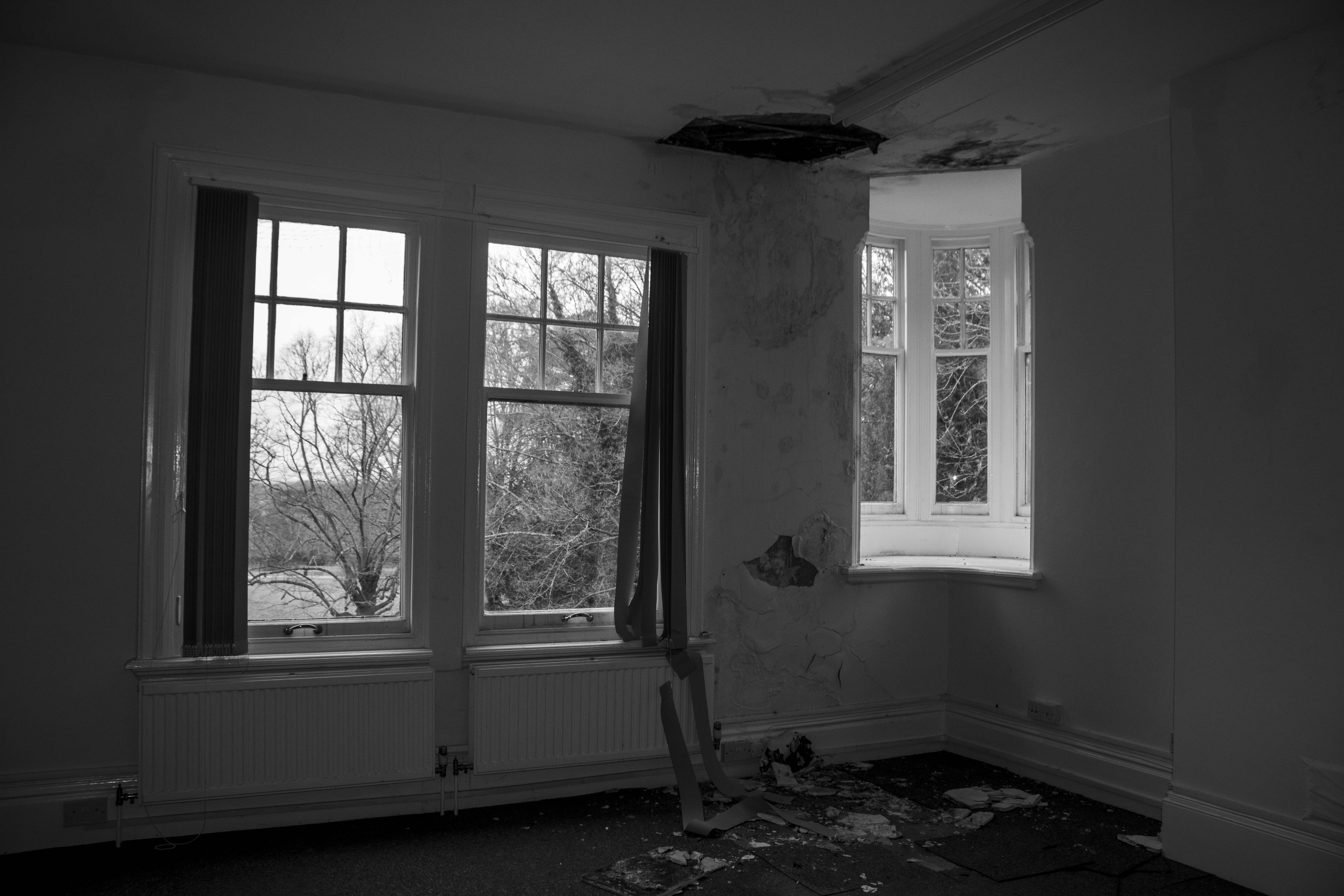 Rubble-strewn office with broken windows