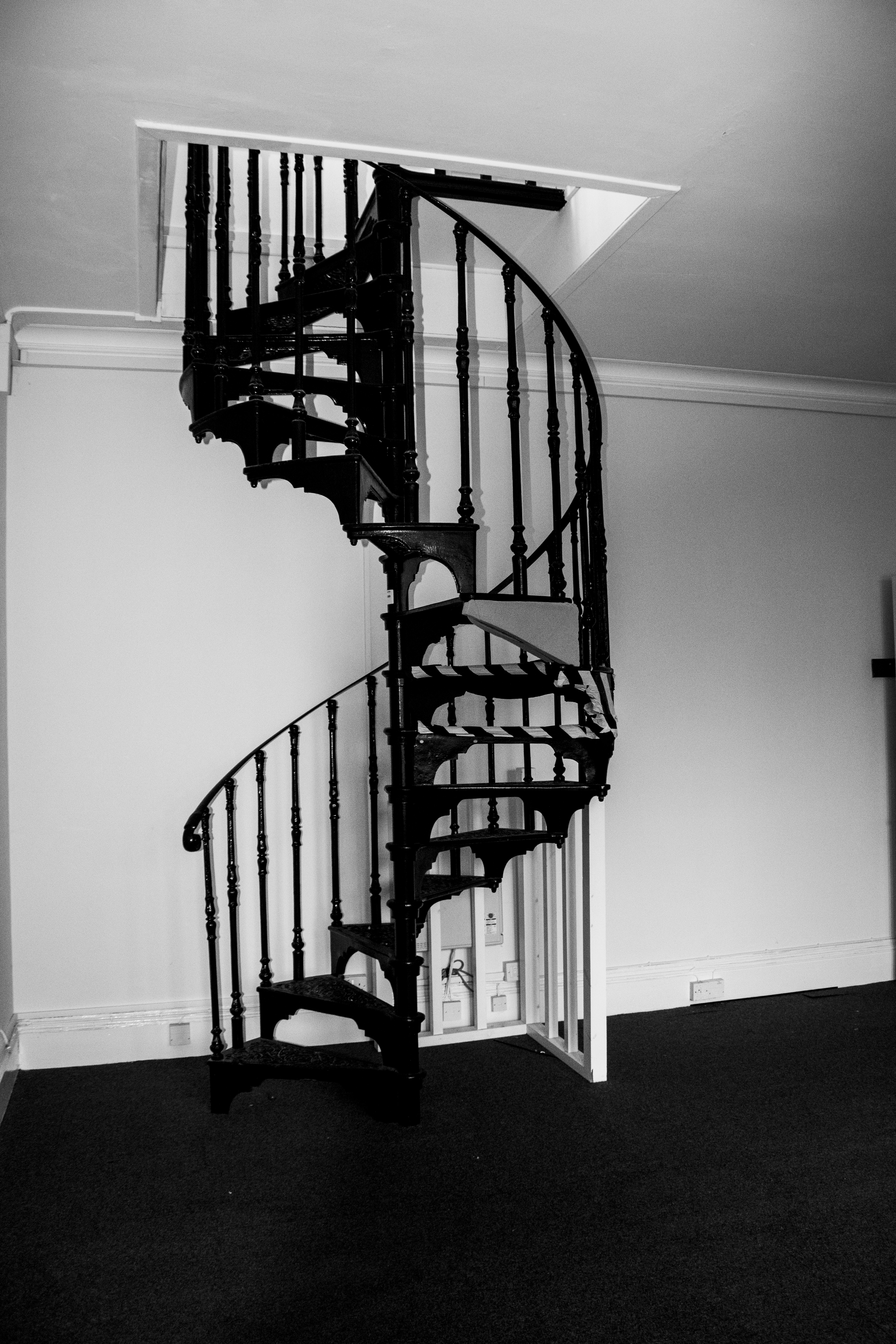 Spiral staircase stripped of paint and fittings