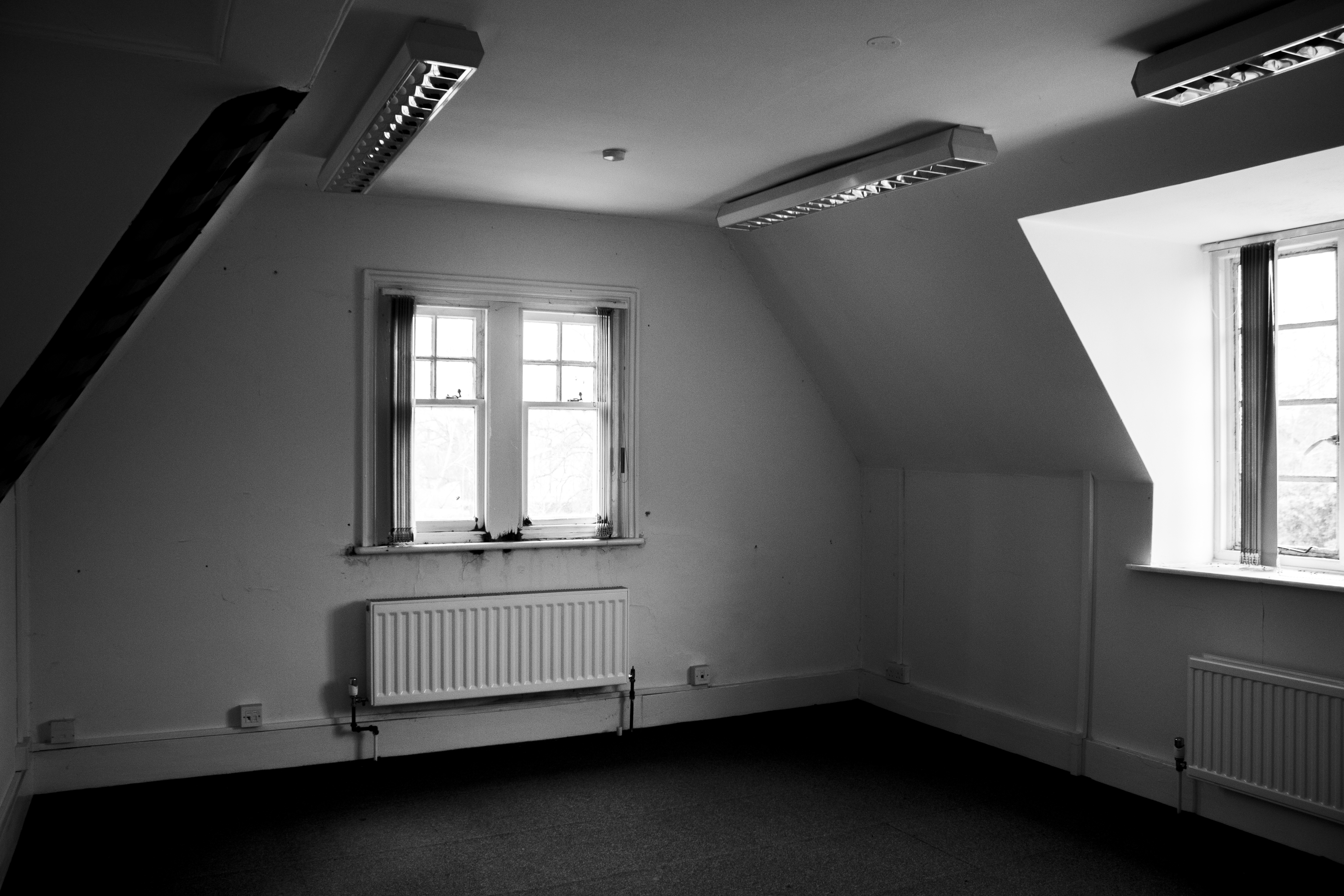 Attic office space with exposed beams